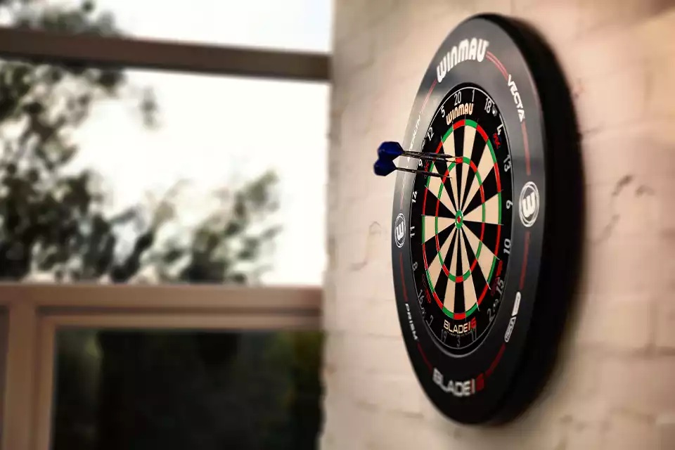 Dart board setup showing official distance and height measurements