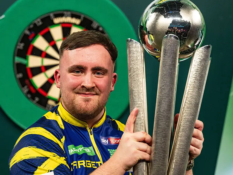 Luke Littler celebrating his 2026 PDC World Championship win