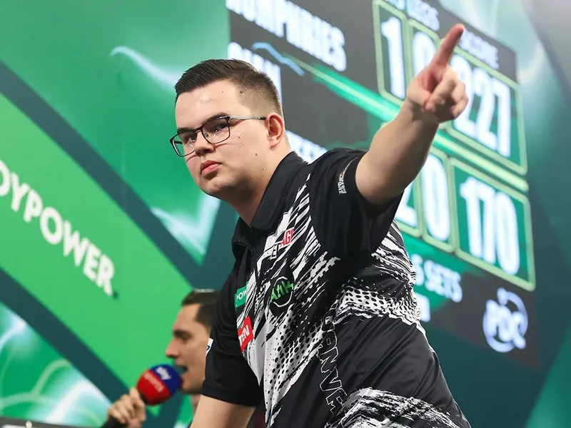 Gian van Veen celebrating a win on the PDC stage